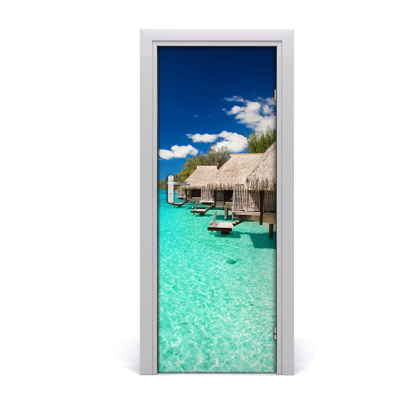 Sticker porte Chalets sur une plage paradisiaque