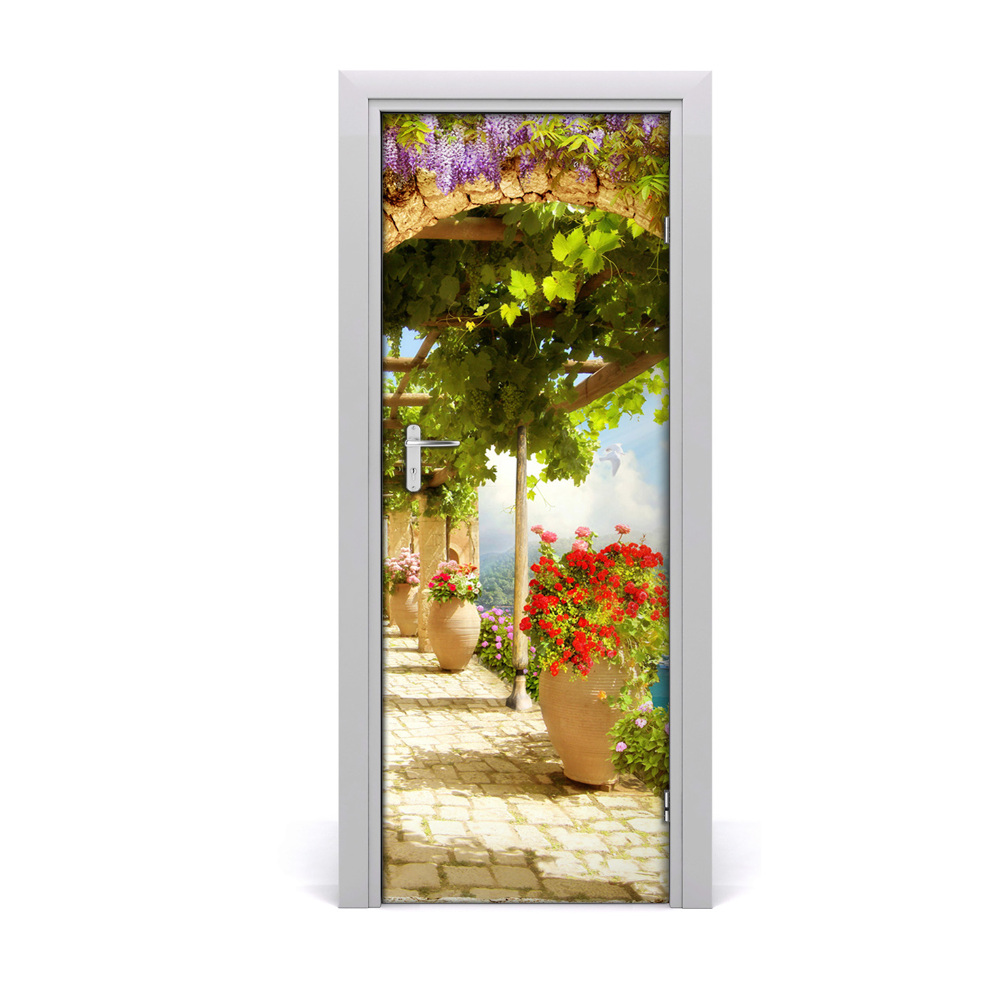Décoration porte Fleurs dans une grande cruche