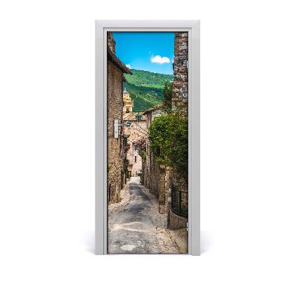 Sticker porte Rue charmante collines vertes