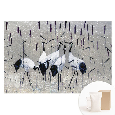 Papier peint intissé Des grues élégantes parmi l'herbe