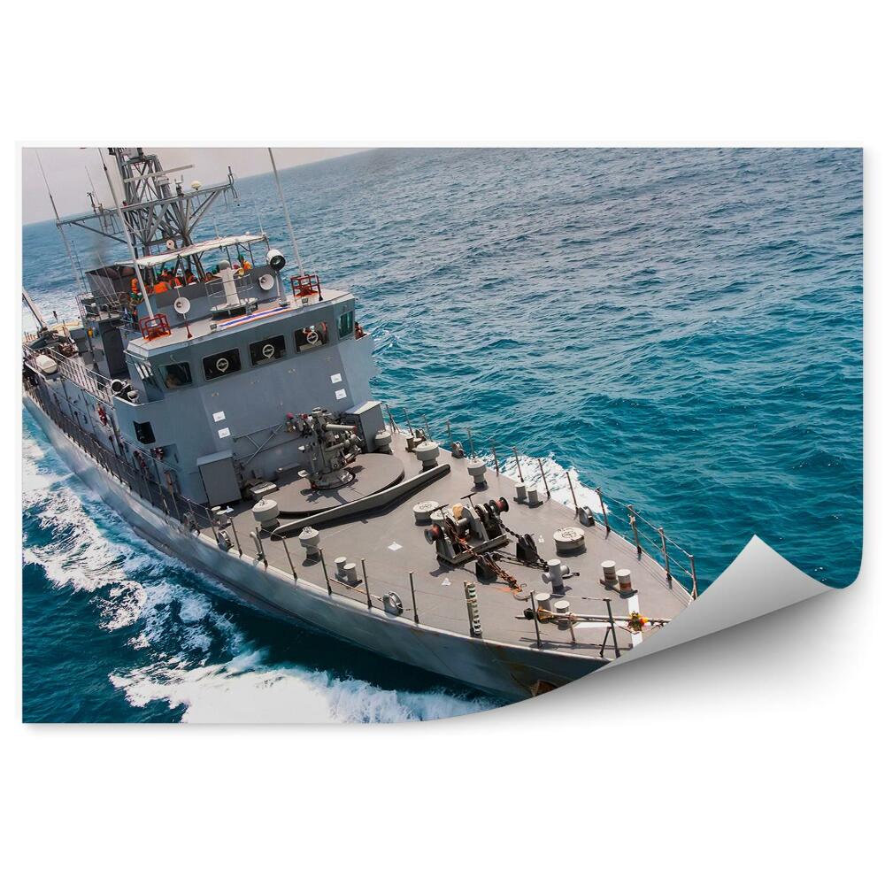 Papier peint Navire militaire gris vagues mer bleue