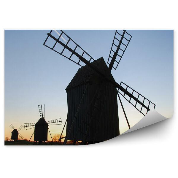 Papier peint Vieux moulins à vent en bois au crépuscule