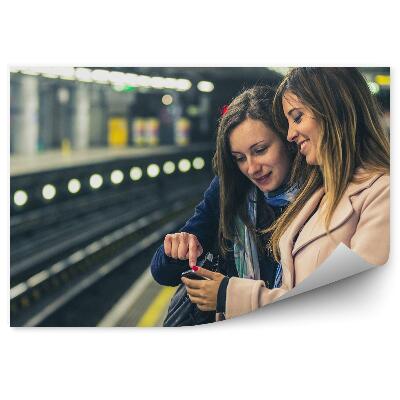 Papier peint Filles à la station de métro de Londres