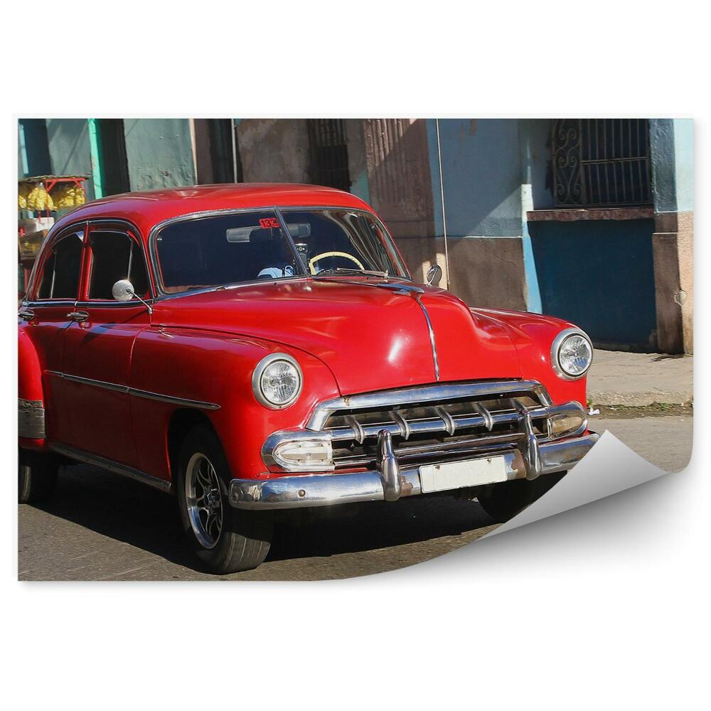 Papier peint Vieille voiture rouge dans la rue