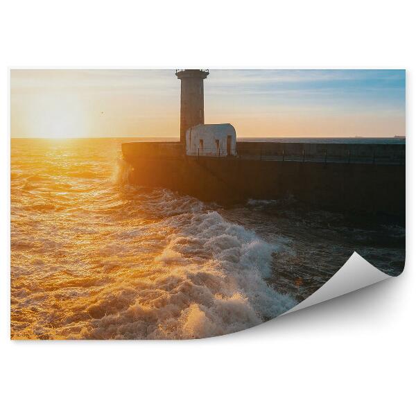 Papier peint Phare sur une jetée en béton vagues de la mer