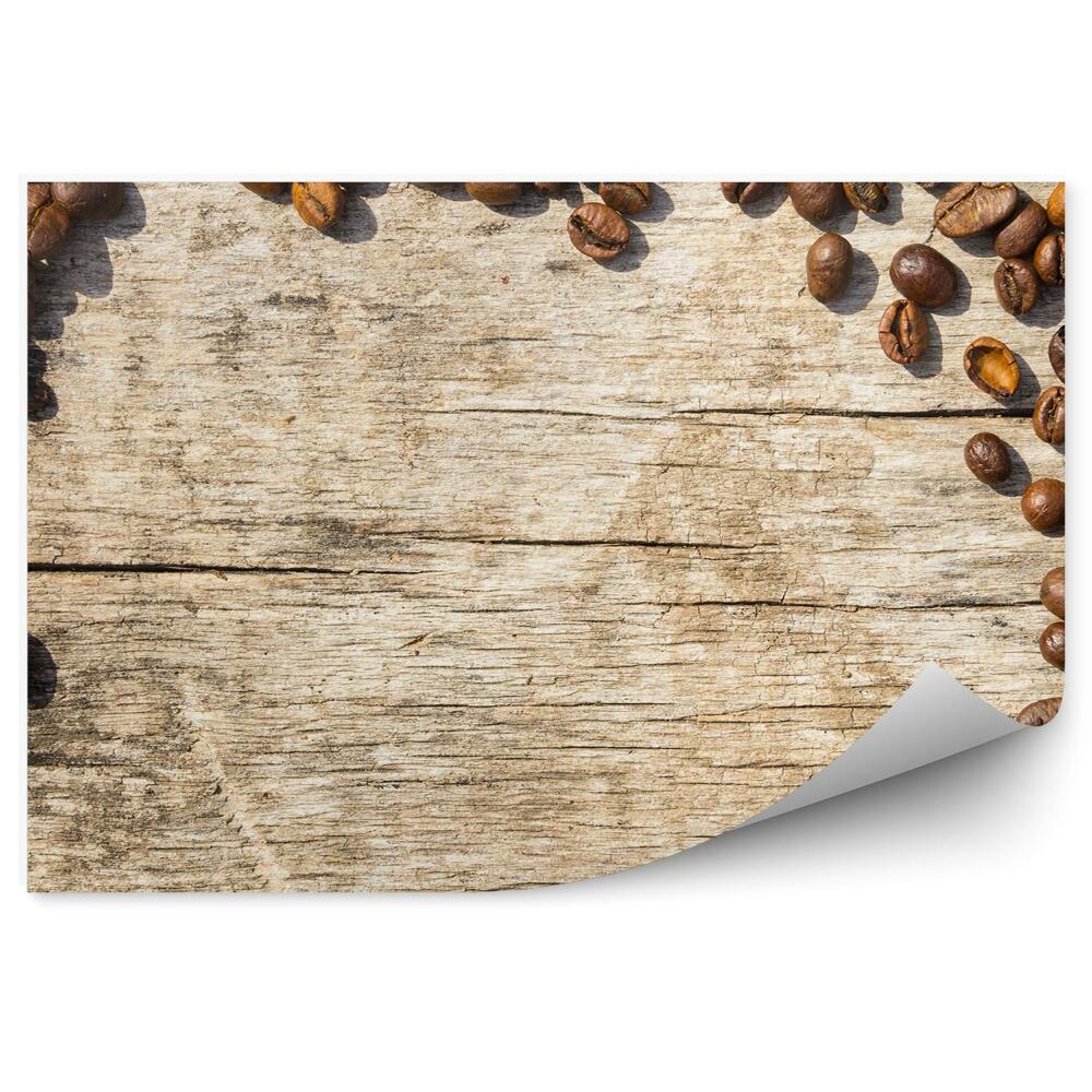 Tapisserie panoramique Cadre fond bois grains de café éparpillés