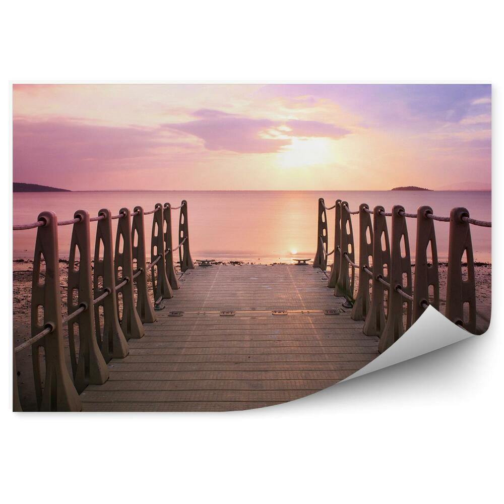Papier peint Soleil rose au-dessus de l'horizon Jetée de plage