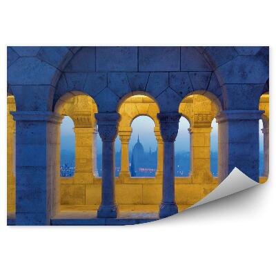 Papier peint Colonnes d'arcade d'une tour illuminée