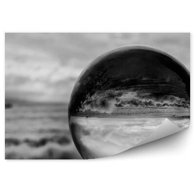 Papier peint Boule noire et blanche reflétant le paysage Vagues