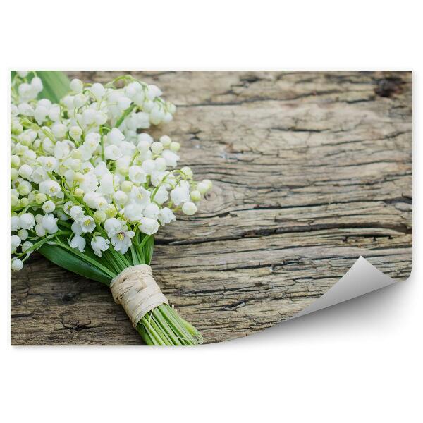 Papier peint Bouquet de muguet sur planche de bois