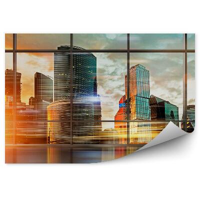 Papier peint Mouvement de lumière éclairant la ville derrière la fenêtre