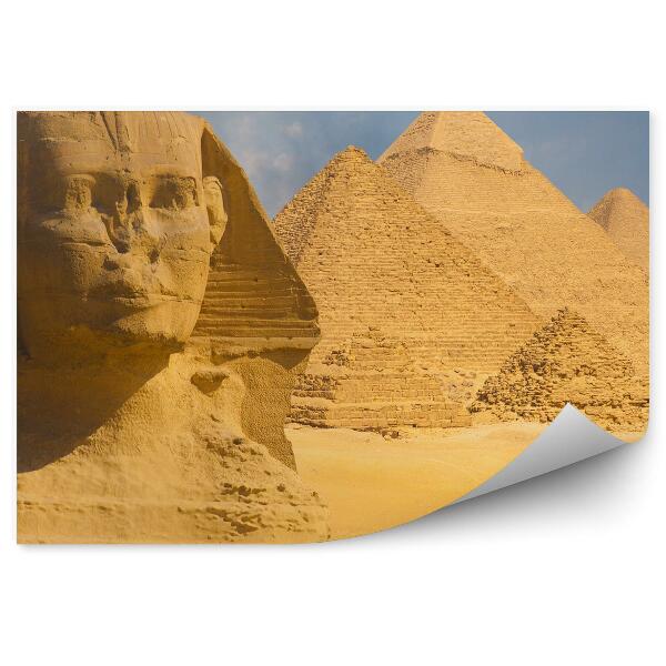 Papier peint Le visage du grand sphinx sur fond de pyramides de Gizeh