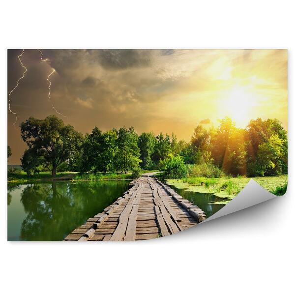 Papier peint Pont En Bois Lac Arbres Ciel Nuages Tempête Coucher De Soleil