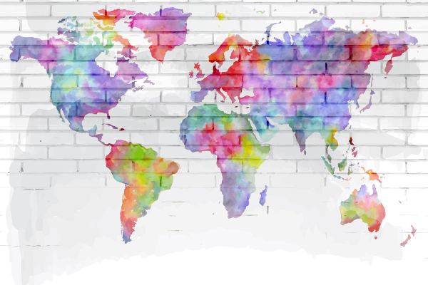 Papier peint Carte du monde aquarellée sur un mur de briques