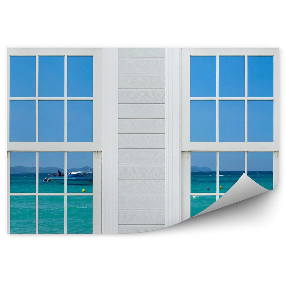Papier peint Fenêtre donnant sur la mer et un bateau à moteur