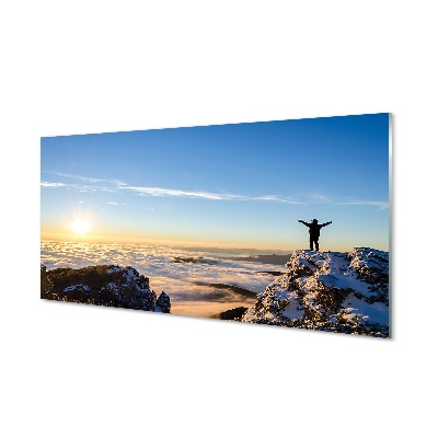 Tableau photo sur verre Montagne nuages ​​homme est