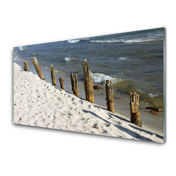 Tableau photo sur verre Piles au bord de la mer