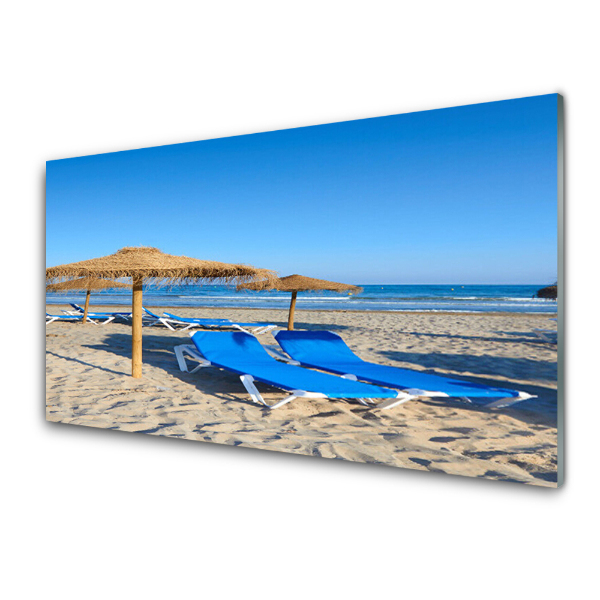 Tableau imprimé sur verre Chaises longues bleues sur la plage