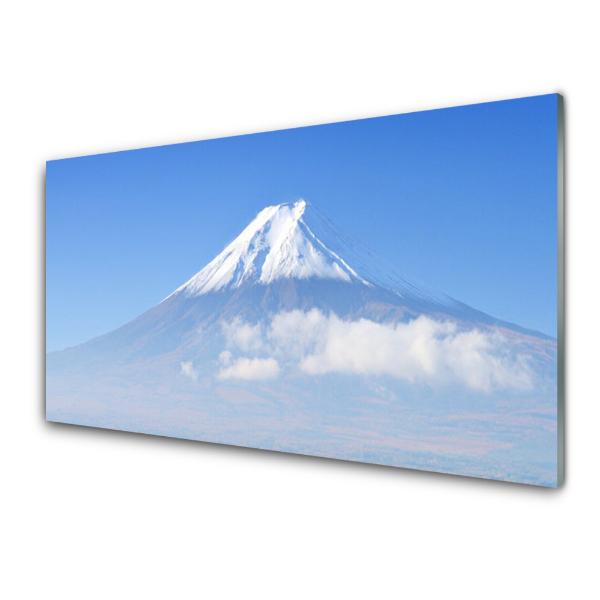 Tableau verre imprimé Pic d'une montagne dans les nuages