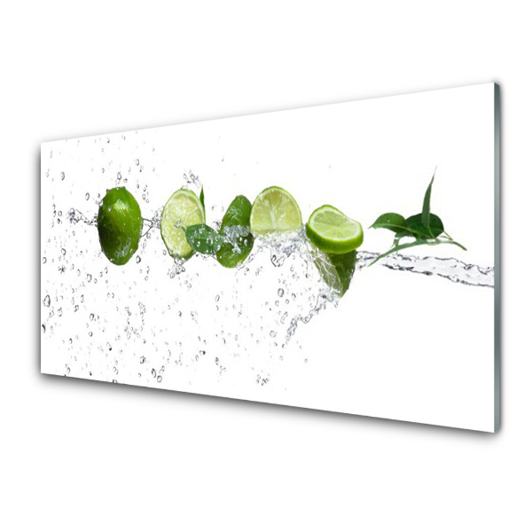 Tableau photo sur verre Moitié de citron vert dans l'eau