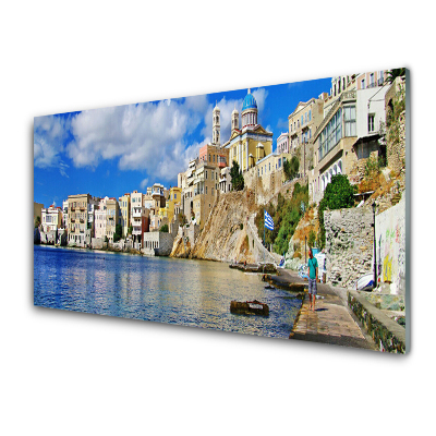 Tableau photo sur verre Ville sur un rocher au bord de la mer