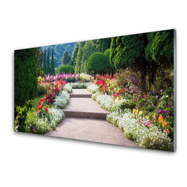 Tableau en verre Escalier dans un parc parmi les fleurs