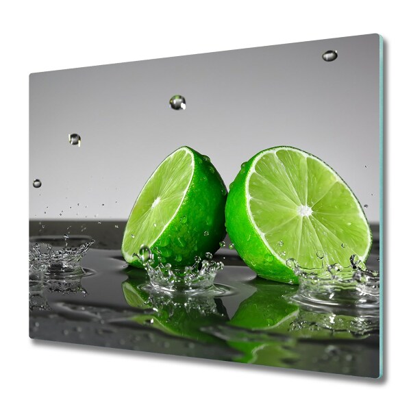 Couvre plaque de cuisson Moitiés de citron vert sur l'eau