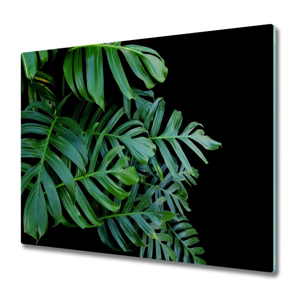 Cache plaque de cuisson Monstera sur fond noir