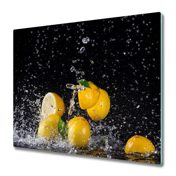 Protection pour plaque de cuisson Citrons frais sur fond noir