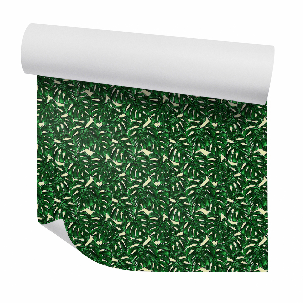 Papier peint Motif dense de feuilles tropicales