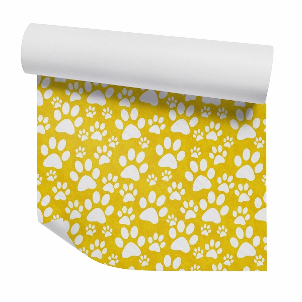 Papier peint Empreintes de pattes blanches sur fond jaune