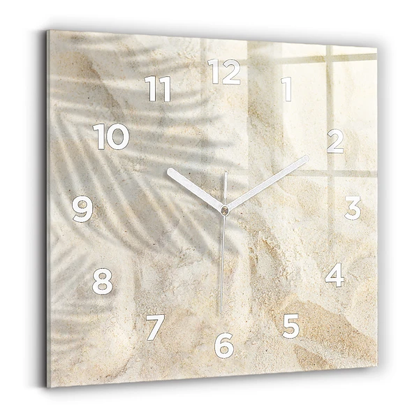 Horloge murale carrée Ombre d'un palmier sur le sable