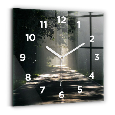 Horloge murale carrée Route forestière et traînées de soleil