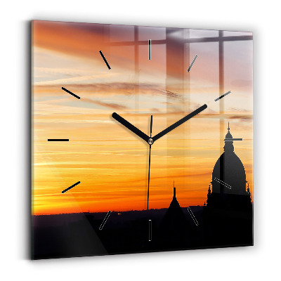 Horloge carrée en verre Bâtiment et coucher de soleil