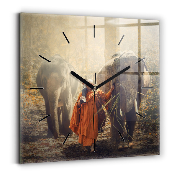 Horloge carrée en verre Moine guidant des éléphants