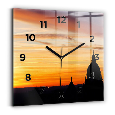 Horloge carrée en verre Bâtiment et coucher de soleil
