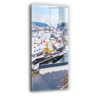 Horloge murale verticale Panorama de la ville en hiver