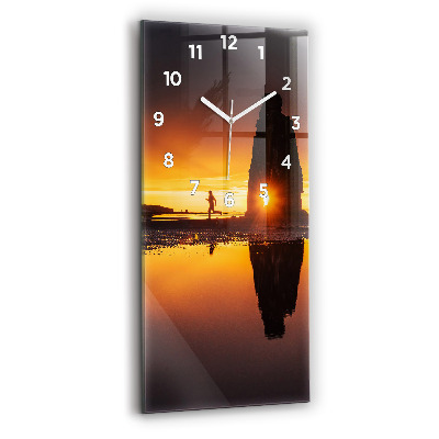 Horloge rectangulaire verticale Coureur et coucher de soleil