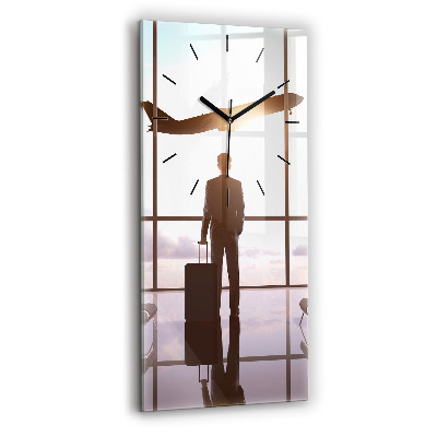 Horloge murale verticale Homme à l'aéroport