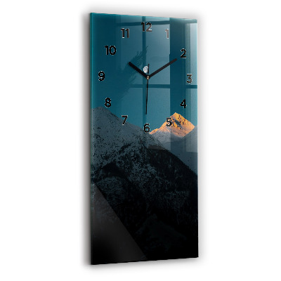 Horloge murale verticale Coucher de soleil dans les montagnes