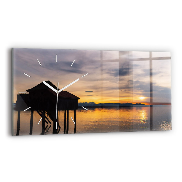 Horloge murale horizontale Coucher de soleil sur un lac