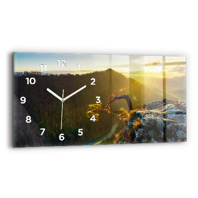 Horloge murale horizontale Coucher de soleil sur les montagnes