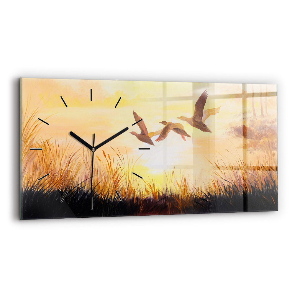 Horloge horizontale en verre Grues au coucher du soleil