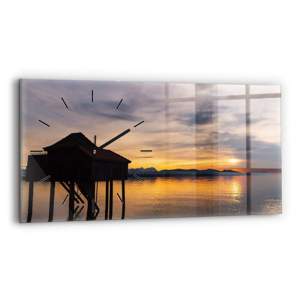 Horloge murale horizontale Coucher de soleil sur un lac