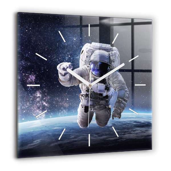 Horloge murale carrée 60x60 cm Astronaute au-dessus du sol