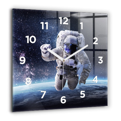 Horloge murale carrée 60x60 cm Astronaute au-dessus du sol