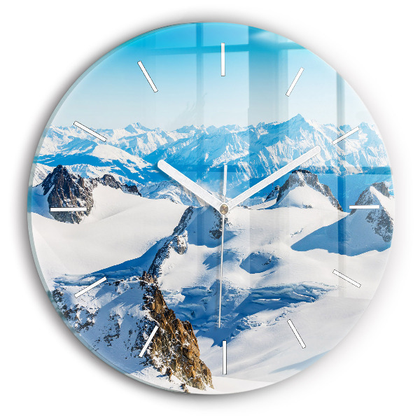 Horloge ronde murale Skieur dans les Alpes