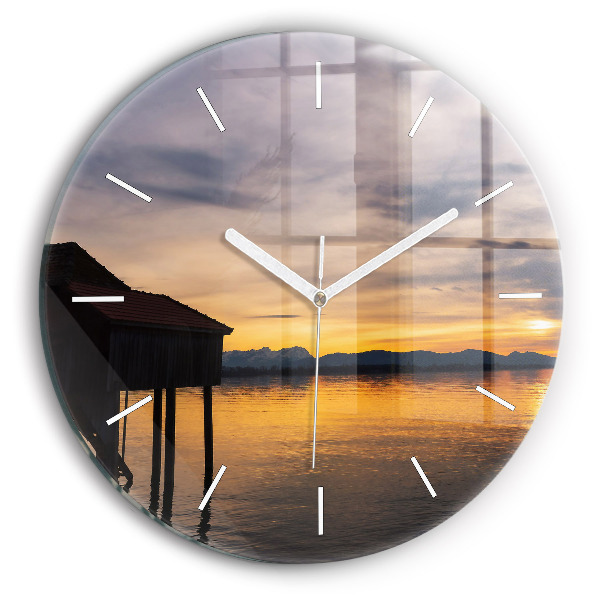 Horloge ronde Coucher de soleil sur un lac