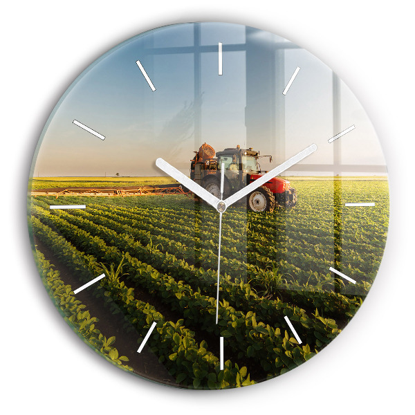 Horloge ronde murale Tracteur dans un champ agricole