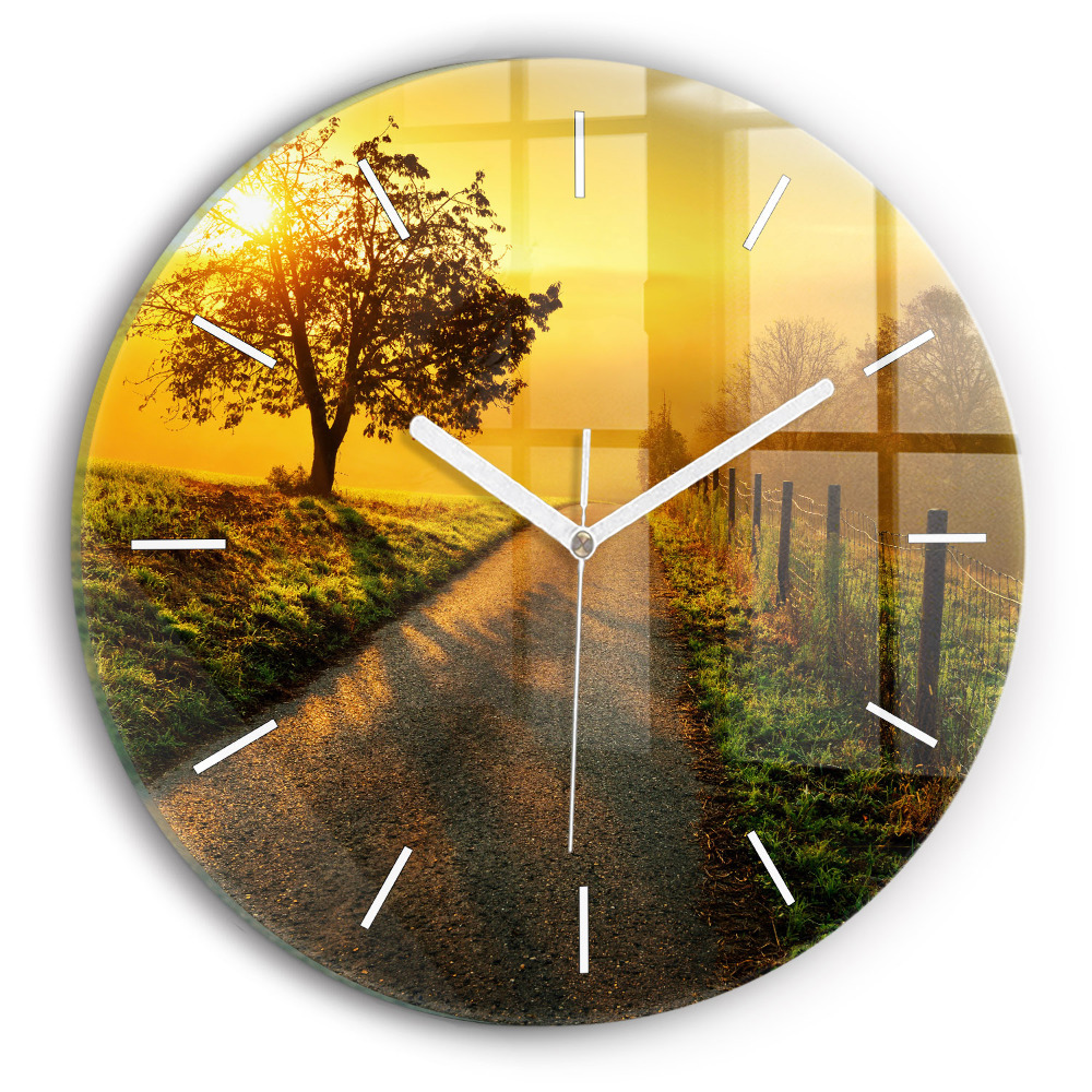 Horloge ronde en verre Brume au lever du soleil